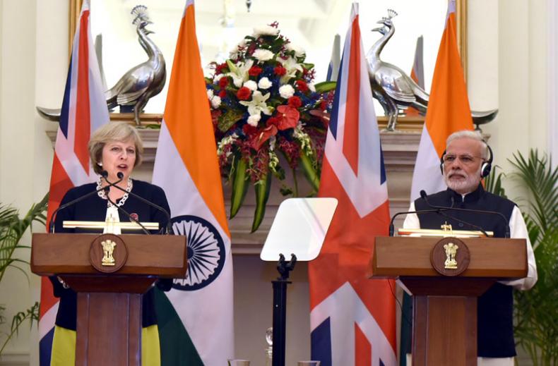 UK & India PMs talk bilaterally, with liberalising services clearly on agenda