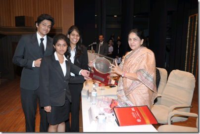 The Nalsar team (from L-R - Devdeep, Malavika & Charitha) receiving the award from Justice Gyansudha Misra (click to enlarge)