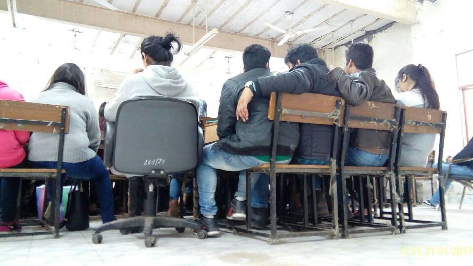 DU law classrooms are so badly overcrowded that students have to share and bring in extra seats